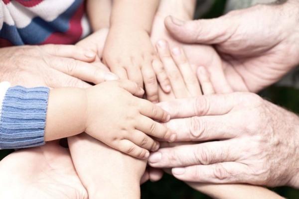 Family-holding-hands-together-600x400.jpg